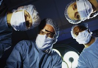 surgeons-looking-at-patient1