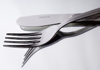 Knife and fork on white